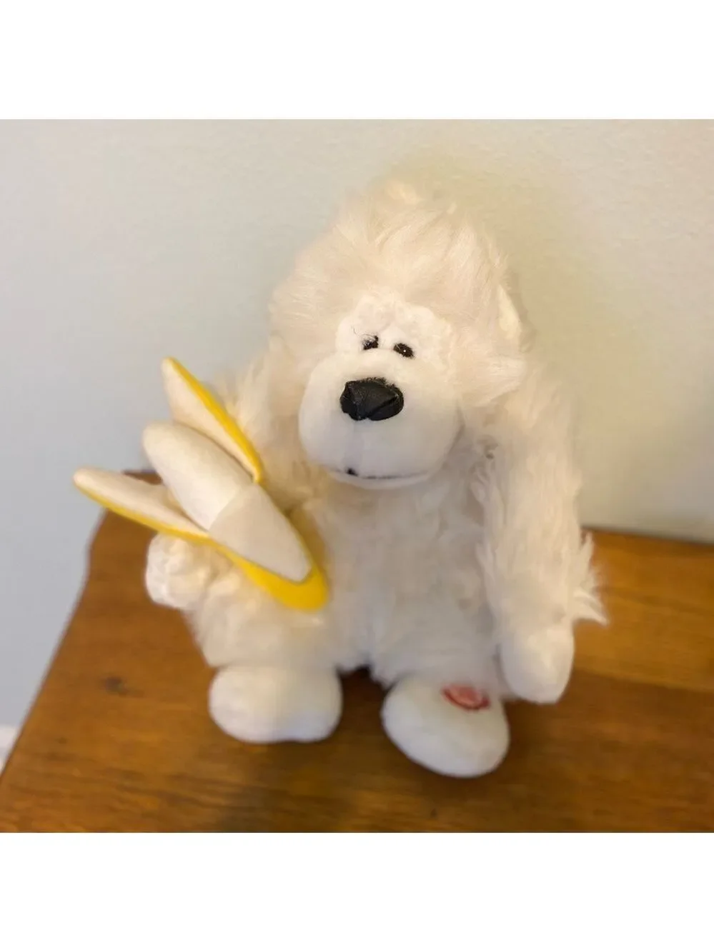 Animated stuffed Gorilla. Press button and he sings and moves Needs 2 AA Battery